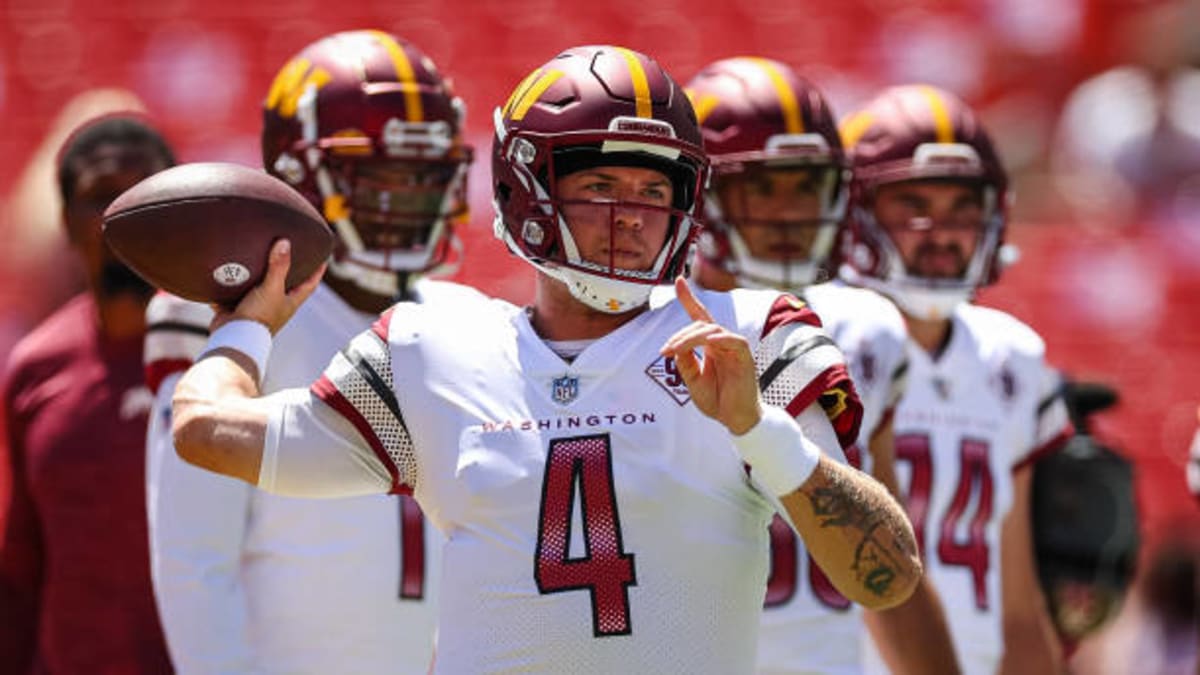 Washington Football Team quarterback Taylor Heinicke (4) warms up before an NFL  football game against the New York Giants on Sunday, Jan. 9, 2022, in East  Rutherford, N.J. (AP Photo/Adam Hunger Stock