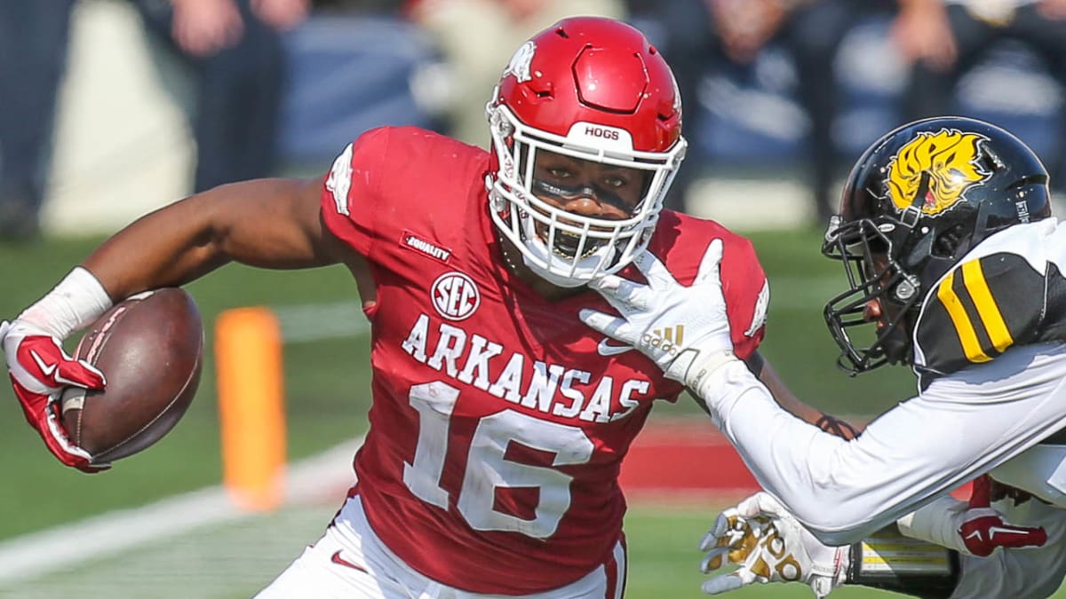 NFL draft: Arkansas' Treylon Burks has giant hands, hunts hogs with knives,  could be WR1