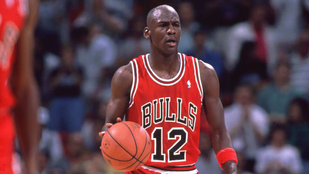 Chicago Bulls guard Michael Jordan wearing a jersey with number 12 during a game against the Orlando Magic at the Orlando Arena on a night when Jordan's regular jersey was stolen in 1990