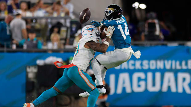 Miami Dolphins starting safeties battling troublesome injuries - Sports ...