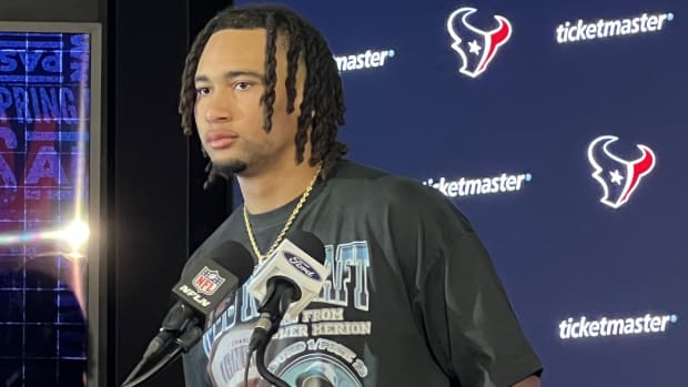 Houston Texans' quarterback C.J. Stroud wearing a shirt that features basketball legend Kobe Bryant.