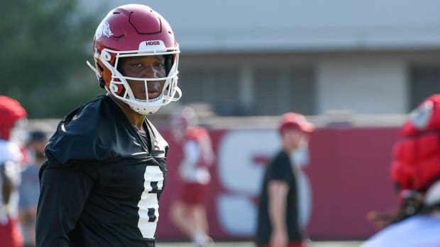 Razorbacks quarterback Jacolby Criswell during Friday morning's practice on the outdoor fields