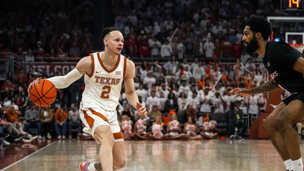 Texas Longhorns guard Chendall Weaver (2) dribbles the ball towards the Houston basket during the basketball game at the Moody Center on Monday, Jan. 29, 2024 in Austin