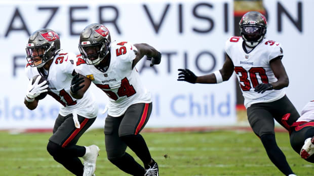 Tampa Bay Buccaneers safety Antoine Winfield Jr. (31) runs the ball against the Tennessee Titans during the fourth quarter at Raymond James Stadium in Tampa, Fla., Sunday, Nov. 12, 2023