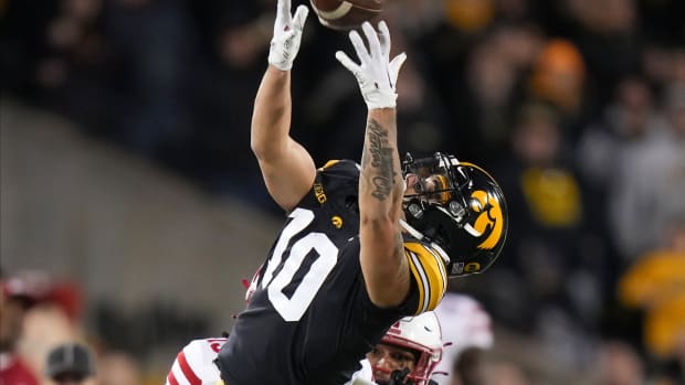 Iowa wide receiver Arland Bruce IV reaches for the ball in the fourth quarter against Nebraska during a NCAA football game on Friday, Nov. 25, 2022, at Kinnick Stadium in Iowa City. Iowavsneb 20221125 Bh