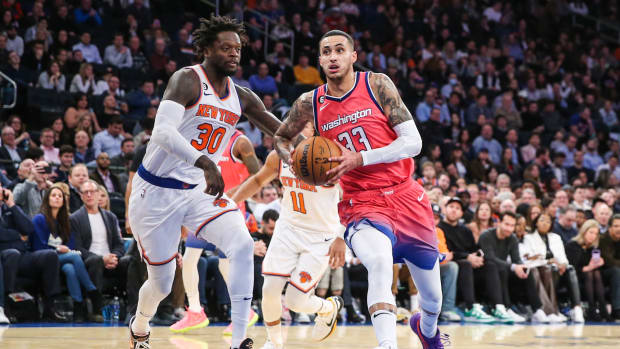 Washington Wizards forward Kyle Kuzma (33) drives against the New York Knicks.