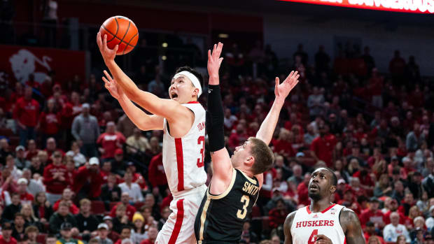 Nebraska guard Keisei Tominaga shoots the ball against Purdue  guard Braden Smith during the first half Tuesday night at Pinnacle Bank Arena in Lincoln. (Jan 9, 2024)