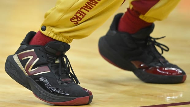 Cleveland Cavaliers guard Darius Garland's black and gold New Balance sneakers.