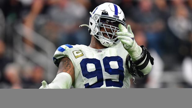 Nov 13, 2022; Paradise, Nevada, USA; Indianapolis Colts defensive tackle DeForest Buckner (99) reacts after sacking Las Vegas Raiders quarterback Derek Carr (4) during the second half at Allegiant Stadium.