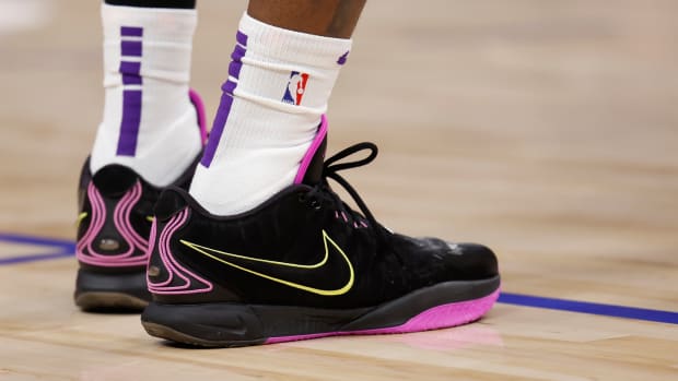 Los Angeles Lakers forward LeBron James' black and pink Nike sneakers.