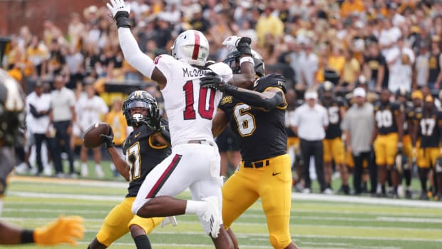 Troy linebacker Jayden McDonald rushes the Appalachian State passer.