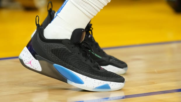 View of black and blue Jordan Luka shoes.
