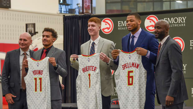 Trae Young with Travis Schlenk's hair : r/AtlantaHawks