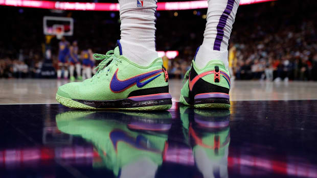 LeBron James Wears Nike Dunk Low Sneaker & Walking Boot - Sports  Illustrated FanNation Kicks News, Analysis and More