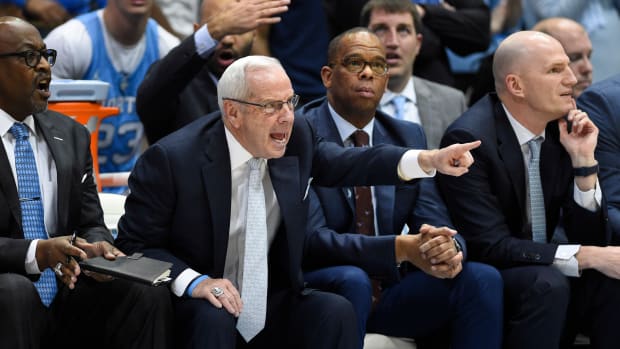 UNC basketball head coach Roy Williams versus Duke