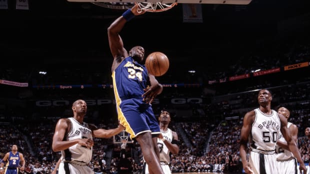 Los Angeles Lakers center Shaquille O'Neal dunks the ball against the San Antonio Spurs.