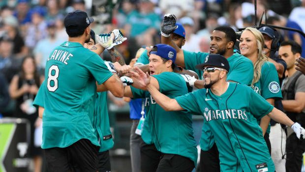 Jul 8, 2023; Seattle, Washington, USA; Team Finch celebrates at home plate after NBA player Zach LaVine hit a home run during the All-Star Celebrity Game at T-Mobile Park.
