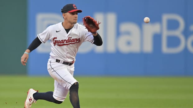 May 26, 2023; Cleveland, Ohio, USA; Cleveland Guardians second baseman Andres Gimenez (0) fields a ball hit by St. Louis Cardinals catcher Willson Contreras (40) during the sixth inning at Progressive Field. Mandatory Credit: Ken Blaze-USA TODAY Sports