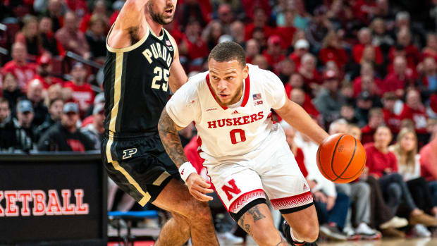 Nebraska guard C.J. Wilcher drives against Purdue guard Ethan Morton during the first half Tuesday night at Pinnacle Bank Arena in Lincoln. (Jan 9, 2024)