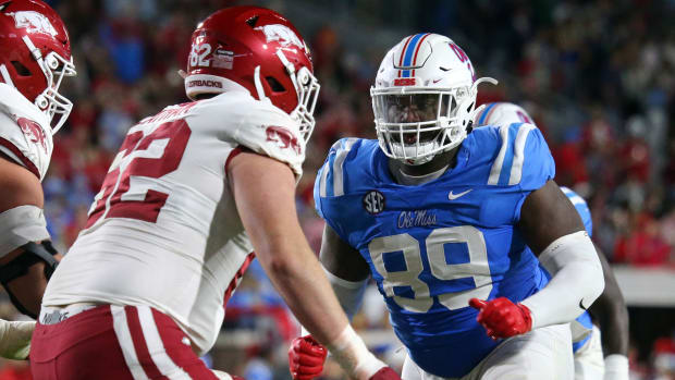 Oct 7, 2023; Oxford, Mississippi, USA; Mississippi Rebels defensive linemen JJ Pegues (89) attempts to get into the Arkansas Razorbacks during the first half at Vaught-Hemingway Stadium. Mandato