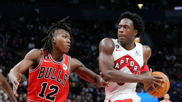 Oct 9, 2022; Toronto, Ontario, CAN; Toronto Raptors forward OG Anunoby (3) drives to the net against Chicago Bulls guard Ayo Dosunmu (12) during the first half at Scotiabank Arena.