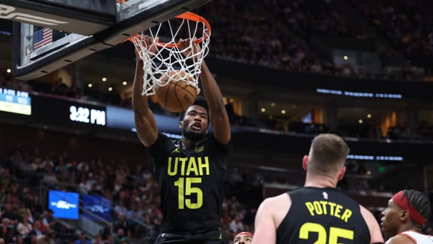 Apr 8, 2023; Salt Lake City, Utah, USA; Utah Jazz center Damian Jones (15) dunks the ball against the Denver Nuggets in the fourth quarter at Vivint Arena.