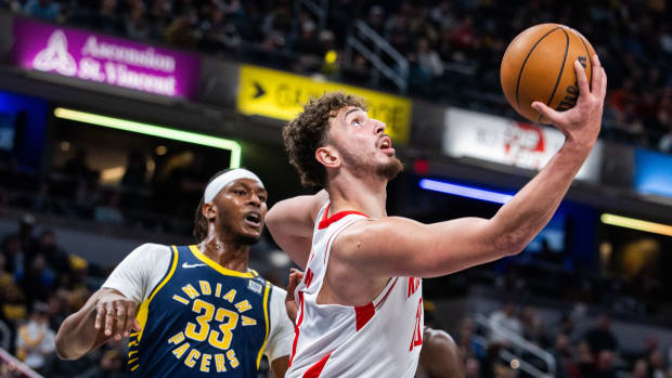 Rockets center Alperen Sengun (28) shoots the ball while Indiana Pacers center Myles Turner (33) defends in the first half at Gainbridge Fieldhouse.