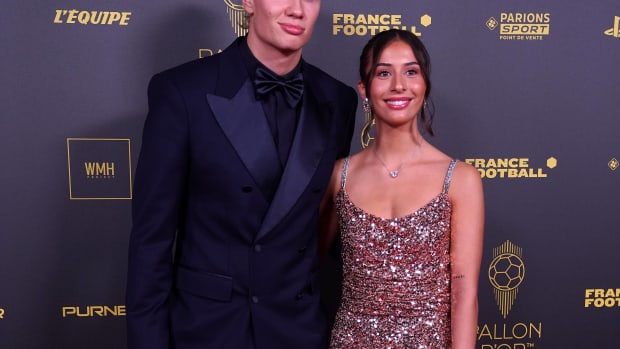 Erling Haaland pictured with his girlfriend, Isabel Haugseng Johansen, on the red carpet at the 2023 Ballon d'Or awards ceremony in Paris