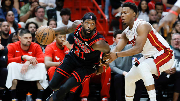 Apr 14, 2023; Miami, Florida, USA; Chicago Bulls guard Patrick Beverley (21) drives to the basket against Miami Heat guard Kyle Lowry (7)