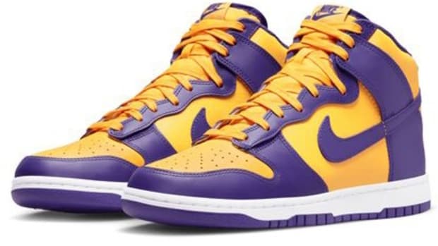 Purple and gold Nike Dunk shoes.