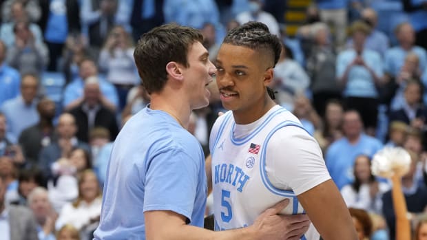 UNC basketball's Tyler Hansbrough and Armando Bacot