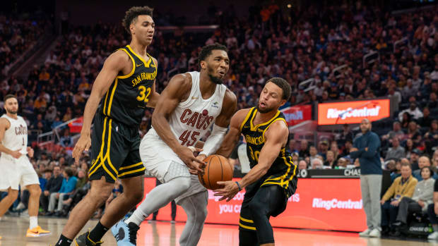 Nov 11, 2023; San Francisco, California, USA; Golden State Warriors guard Stephen Curry (30) steals the basketball from Cleveland Cavaliers guard Donovan Mitchell (45) during the second quarter at Chase Center. Mandatory Credit: Neville E. Guard-USA TODAY Sports