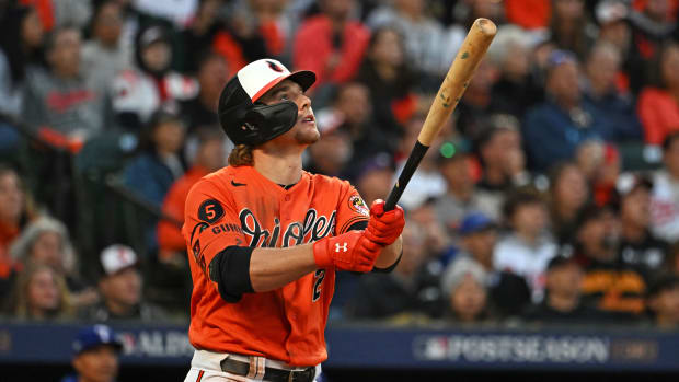 Oct 8, 2023; Baltimore, Maryland, USA; Baltimore Orioles third baseman Gunnar Henderson (2) hits a home run during the fifth inning against the Texas Rangers during game two of the ALDS for the 2023 MLB playoffs at Oriole Park at Camden Yards. Mandatory Credit: Tommy Gilligan-USA TODAY Sports  