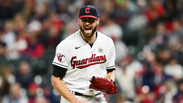 Sep 15, 2023; Cleveland, Ohio, USA; Cleveland Guardians starting pitcher Lucas Giolito (27) reacts after striking out Texas Rangers right fielder Robbie Grossman (not pictured) during the seventh inning at Progressive Field. Mandatory Credit: Ken Blaze-USA TODAY Sports