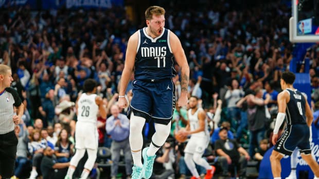 Luka Doncic excited after hitting a game-winning shot for the Dallas Mavericks.