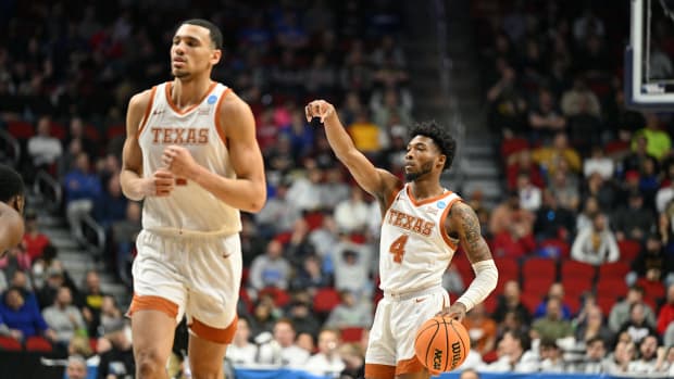 Texas Longhorns guard Tyrese Hunter (4) brings the ball up court against the Penn State Nittany Lions during the second half at Wells Fargo Arena.