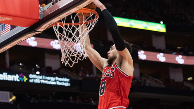 Mar 11, 2023; Houston, Texas, USA; Chicago Bulls guard Zach LaVine (8) dunks against the Houston Rockets