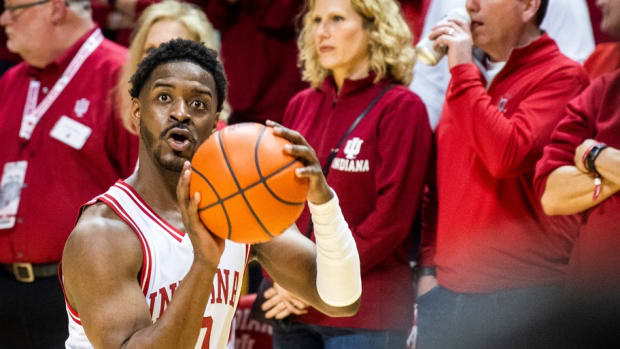 Indiana's Xavier Johnson (0) warms up before the first half of the Indiana versus Iowa men's basketball game at Simon Skjodt Assembly Hall on Tuesday, Feb. 2 8, 2023.