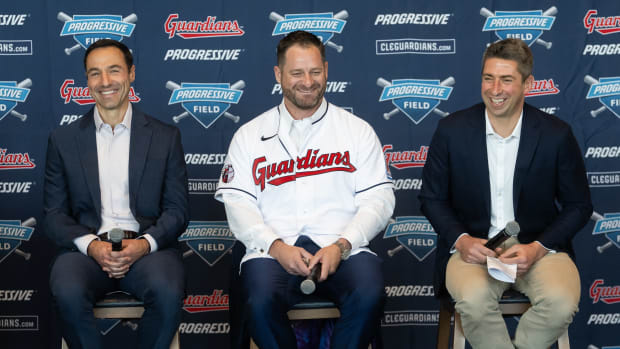 Nov 10, 2023; Cleveland, OH, USA; Cleveland Guardians manager Stephen Vogt, middle, and president of baseball operations Chris Antonetti, left, and general manager Mike Chernoff, right, talk to the media during an introductory press conference at Progressive Field. Mandatory Credit: Ken Blaze-USA TODAY Sports