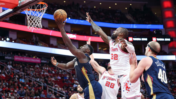 Pelicans forward Zion Williamson scores a basket during the second quarter against the Houston Rockets at Toyota Center.