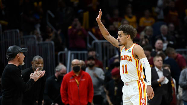 Apr 15, 2022; Cleveland, Ohio, USA; Atlanta Hawks guard Trae Young (11) waves to fans after a win against the Cleveland Cavaliers at Rocket Mortgage FieldHouse.