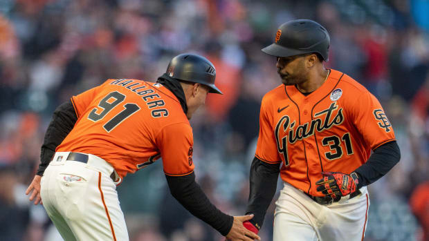 SF Giants: LaMonte Wade Jr., Jackson left game with back tightness - Sports  Illustrated San Francisco Giants News, Analysis and More