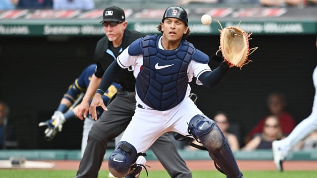 Jun 25, 2023; Cleveland, Ohio, USA; Cleveland Guardians catcher Bo Naylor (23) catches a throw from left fielder Steven Kwan (not pictured) but its too late to tag Milwaukee Brewers second baseman Andruw Monasterio (not pictured) during the fourth inning at Progressive Field. Mandatory Credit: Ken Blaze-USA TODAY Sports