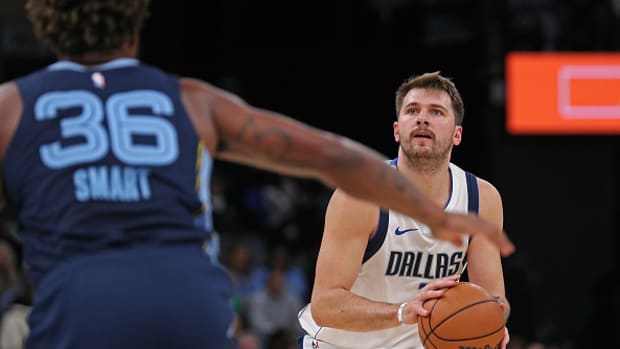 Luka Doncic spots up from deep.