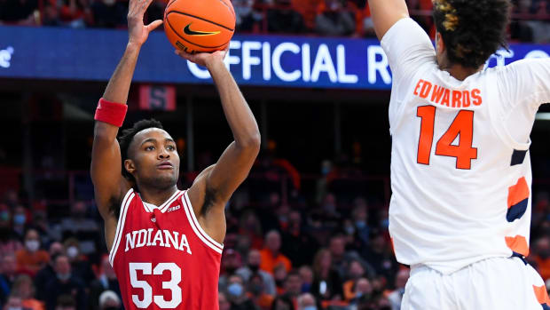 Indiana Hoosiers guard Tamar Bates (53) shoots the ball as Syracuse Orange center Jesse Edwards (14) defends during the first half at the Carrier Dome. (Rich Barnes-USA TODAY Sports)