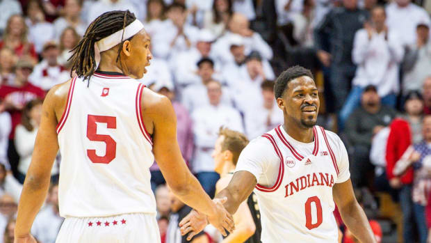 Indiana's Xavier Johnson (0) and Malik Reneau (5) slap hands during the first half of the Indiana versus Purdue men's basketball game at Simon Skjodt Assembly Hall on Tuesday, Jan. 16, 2024.