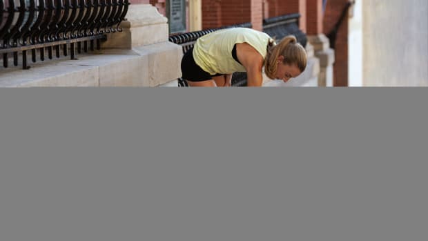 Emily Sisson stretches in a New Balance photo shoot.