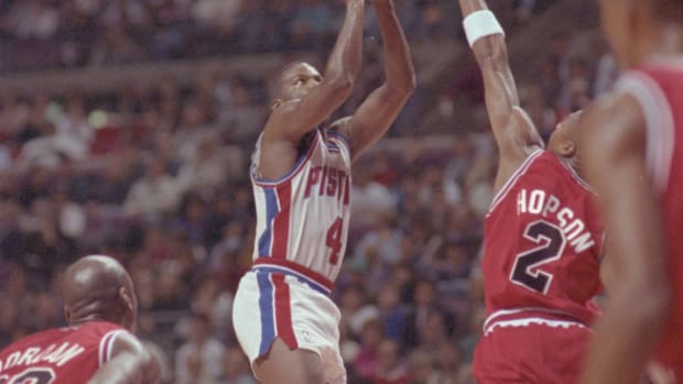 12/19/1990; Detroit, Michigan USA; Pistons'' Joe Dumars shoots the ball while being guarded by Bulls' Dennis Hopson