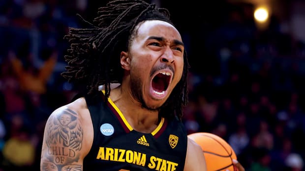 Arizona State Sun Devils guard Frankie Collins reacts after a dunk against the TCU Horned Frogs during the second half at Ball Arena.