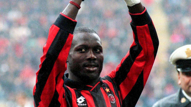 George Weah pictured with his Ballon d'Or trophy in January 1996